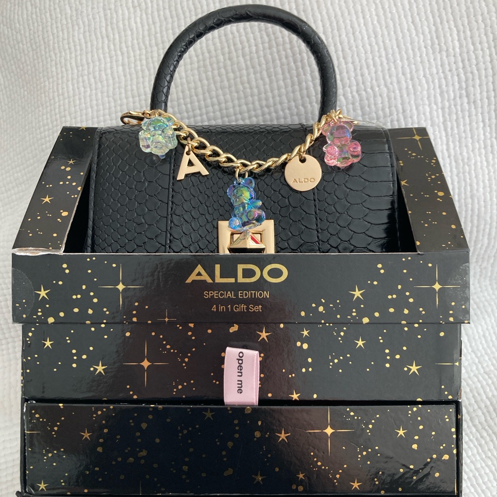 Aldo Black Textured Bag With Gold And Colorful Charms